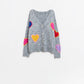 Q2 Grey knitted cardigan with embroidered hearts