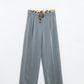 Q2 Grey pleated pants with leopard detail at the waist