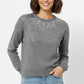Grey soft knit sweater embellished with sequins on the front