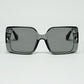 Q2 Grey square sunglasses with gold detail on the side