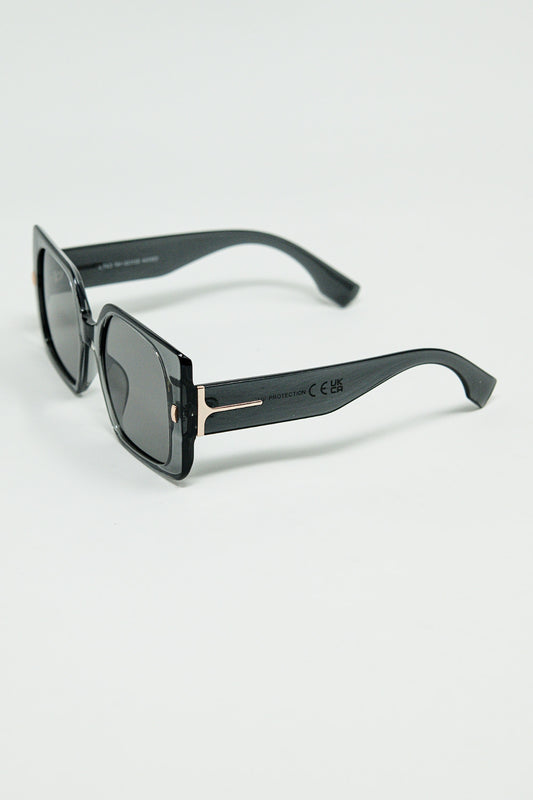 Grey square sunglasses with gold detail on the side