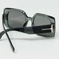 Grey square sunglasses with gold detail on the side