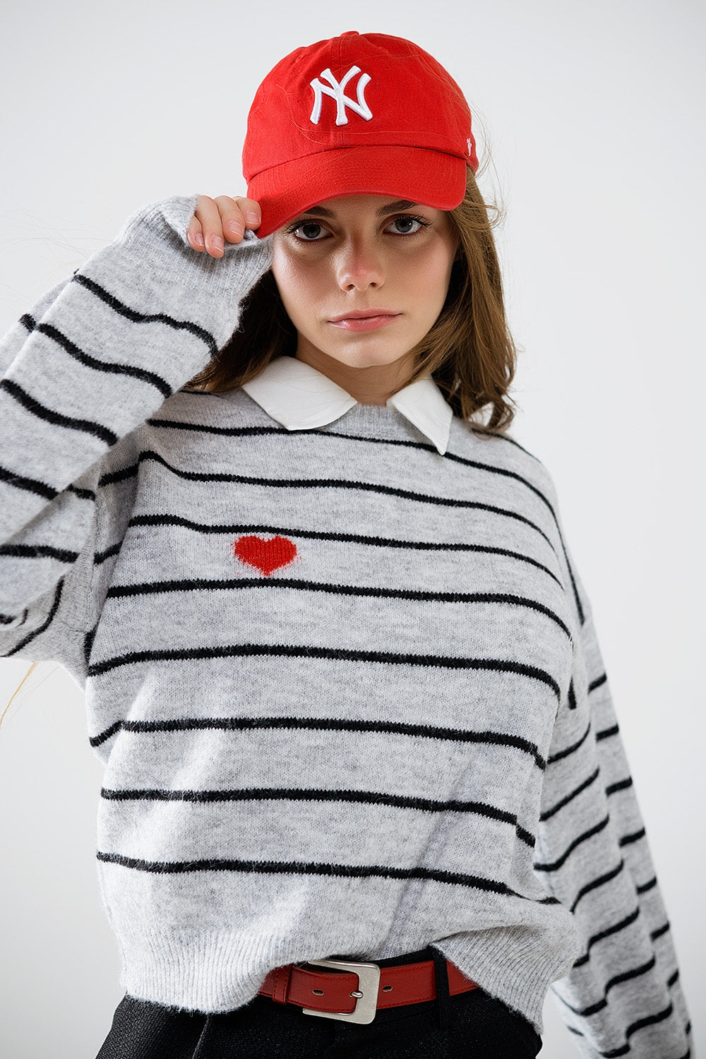 Grey striped sweater with red heart detail