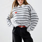 Grey striped sweater with red heart detail