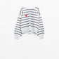 Grey striped sweater with red heart detail