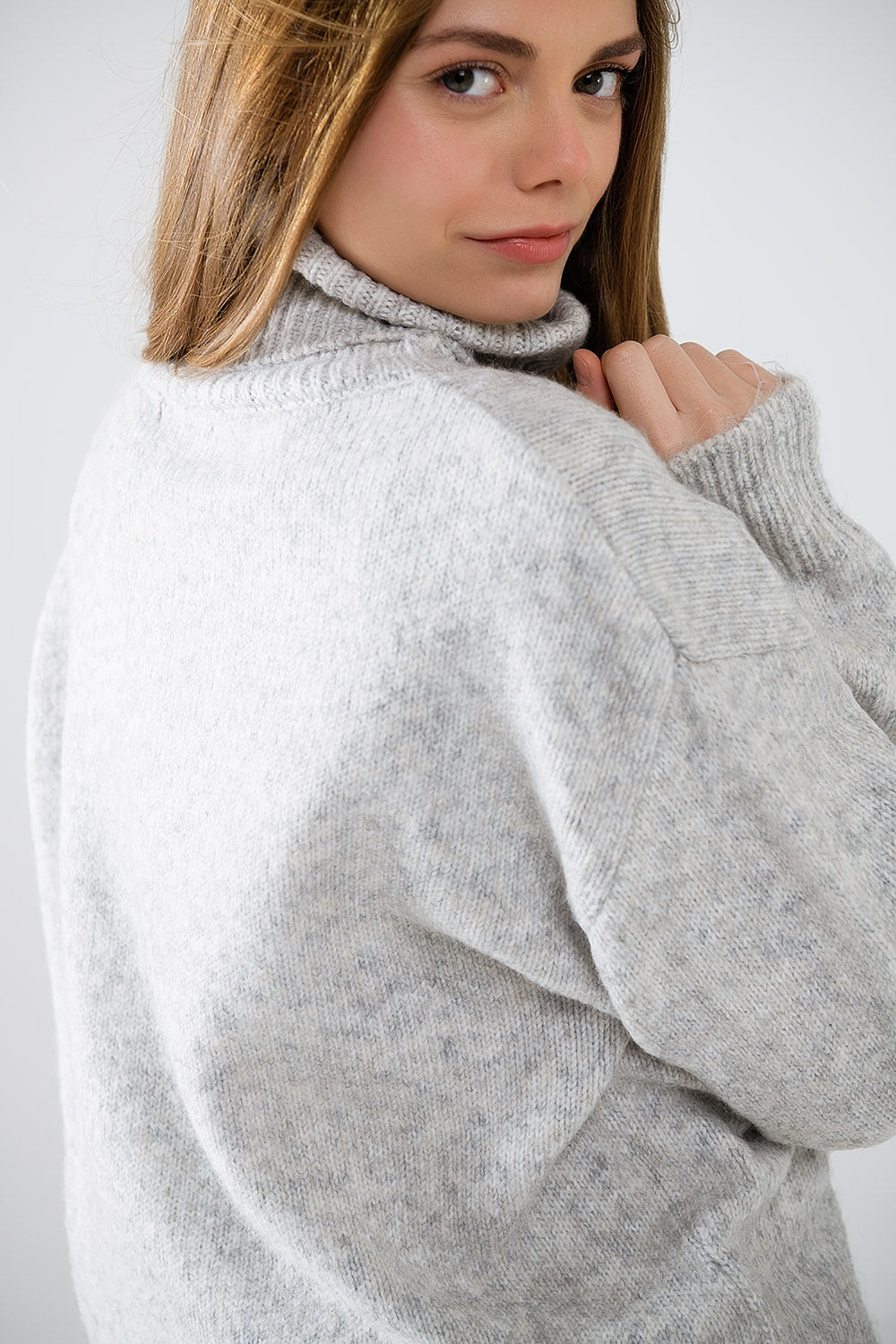 grey turtleneck jumper with dropped sleeves