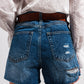 High waisted ripped denim shorts in mid wash