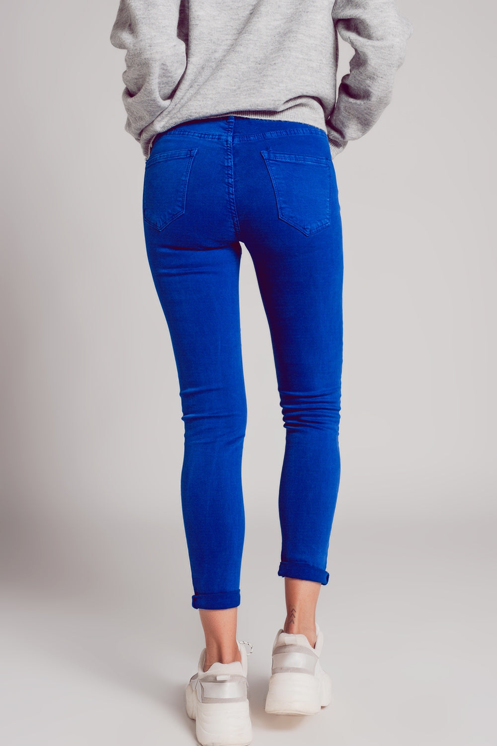 Jeans skinny de talle alto en azul eléctrico