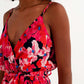 Hot pink short dress with flower print and straps