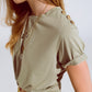 Khaki T-Shirt with golden button detail on shoulder