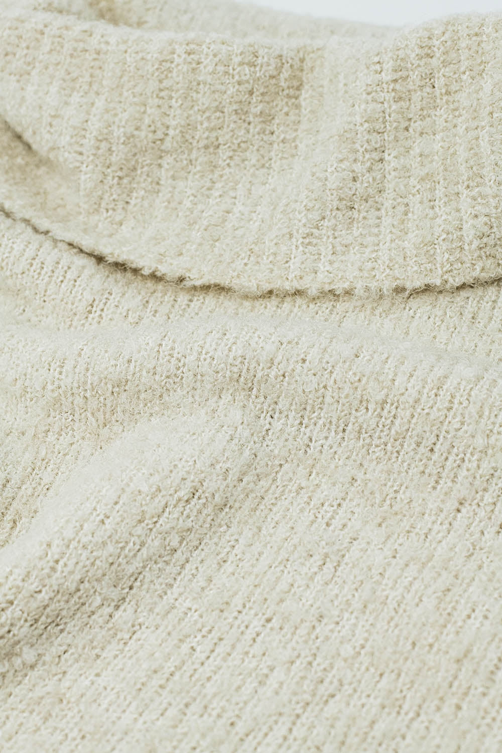 knitted fluffy high neck sweater in beige