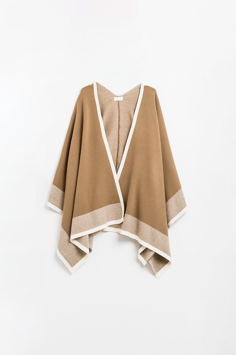 Q2 Knitted poncho in camel with ecru trim