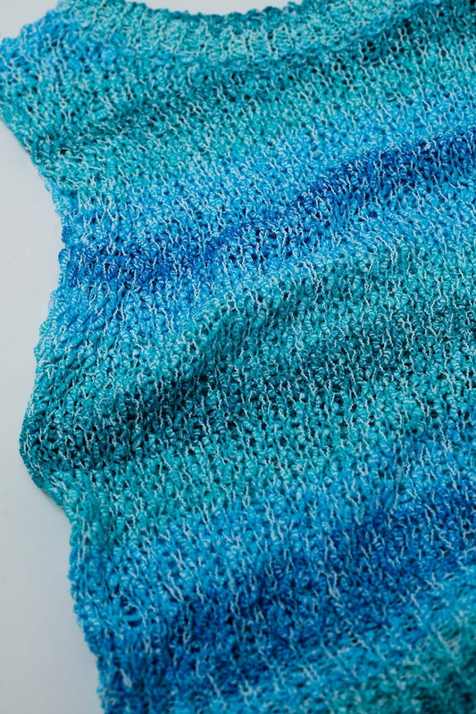 Suéter sin mangas de punto con rayas azules y cuello redondo