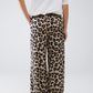 Pantalones con estampado de leopardo, cordón y bolsillos