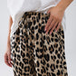 Pantalones con estampado de leopardo, cordón y bolsillos