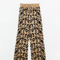 Leopard print pants with stretchy knit and drawstring detail