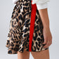 Leopard Print Shorts With Red Stripes On The Sides