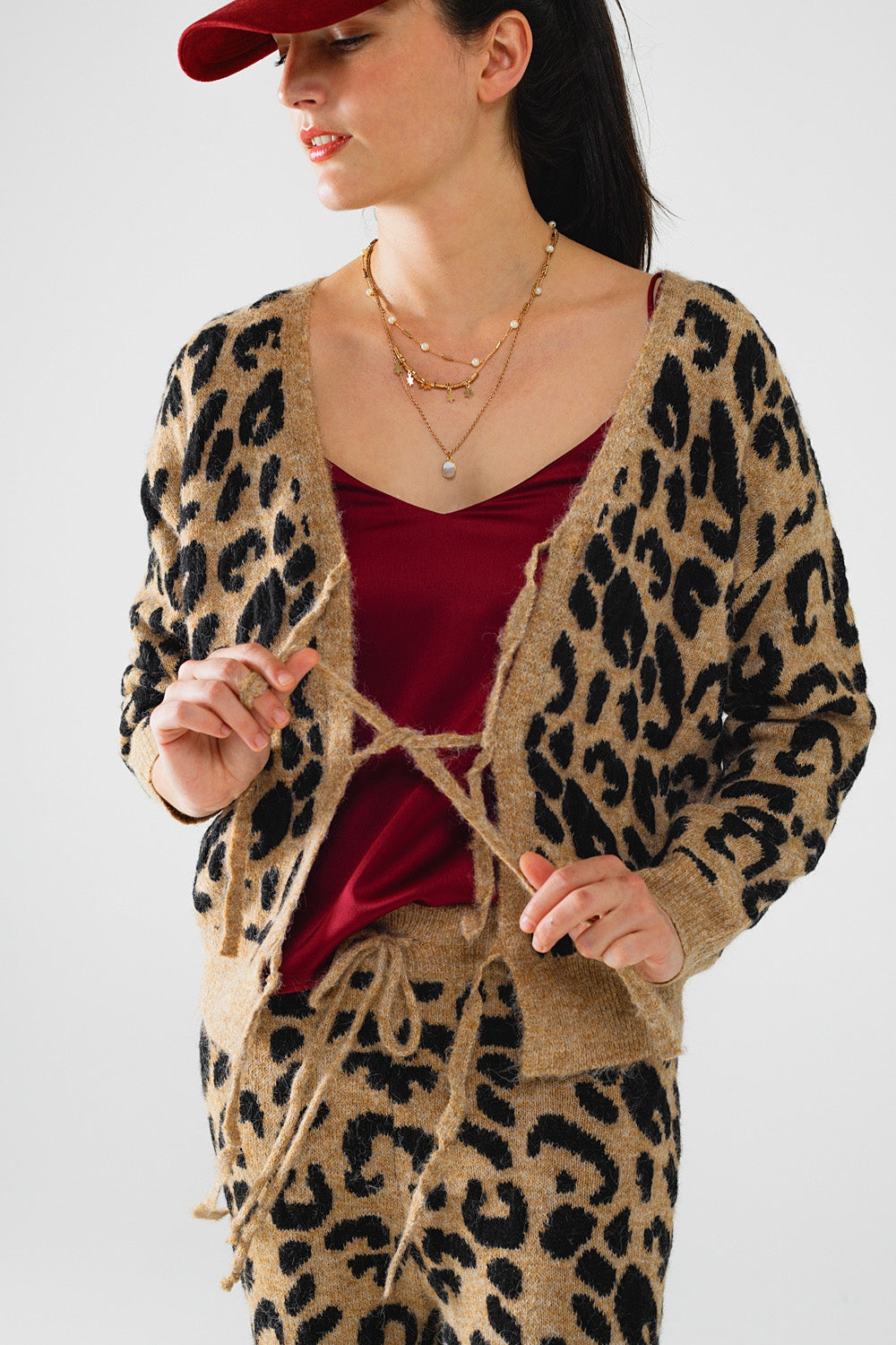 Leopard printed long sleeve cardigan with bows detail