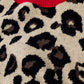 Leopard sweater with red detail on the neck and sleeves