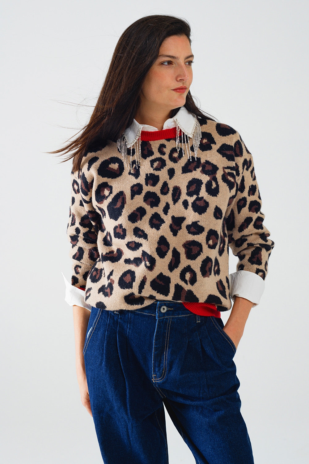 Q2 Leopard sweater with red detail on the neck and sleeves
