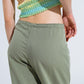 Light Green Relaxed Pants With Drawstring Closing And Side Pockets