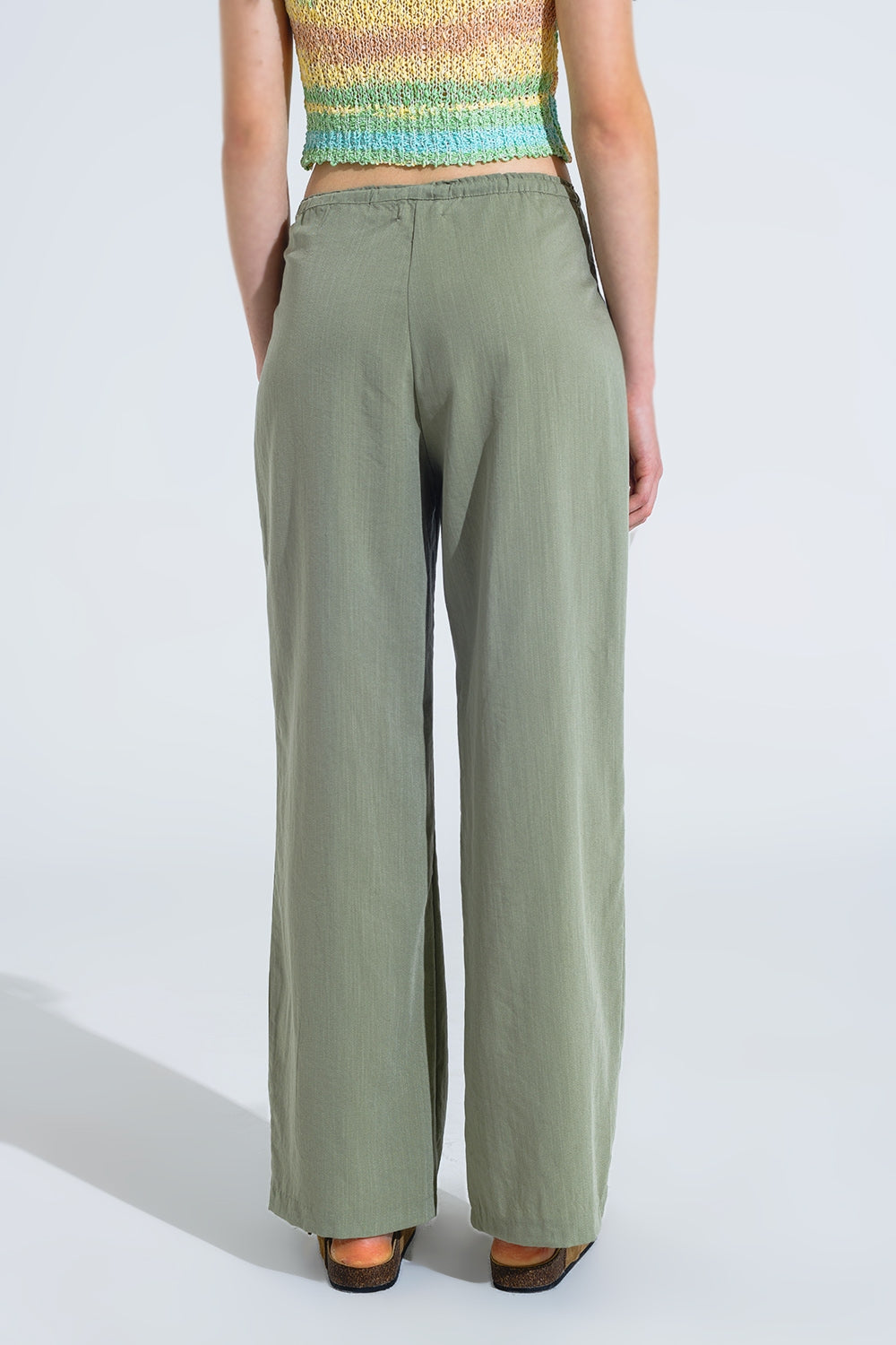 Light Green Relaxed Pants With Drawstring Closing And Side Pockets