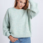 Q2 Light Green sweater with long sleeves and rounded collar