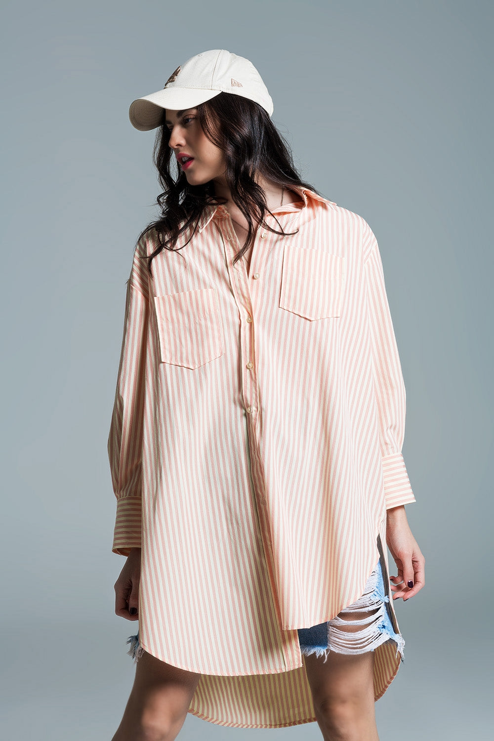 Q2 Light orange oversized blouse with white stripes