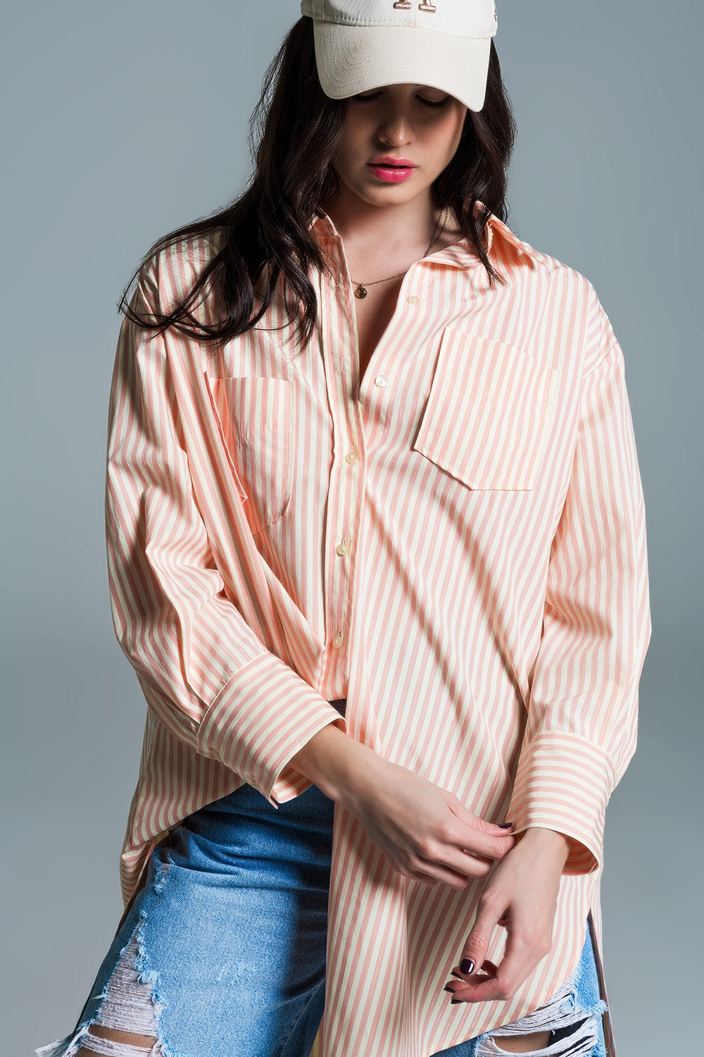 Blusa oversize naranja claro con rayas blancas