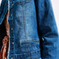 Light wash denim jacket with raw hem edge