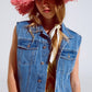 Q2 light wash denim vest with rhinestone detail on the collar