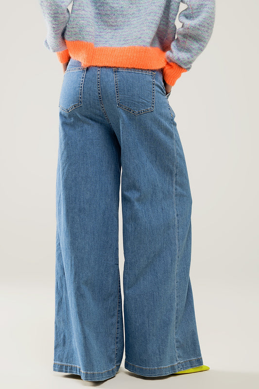 light wash extra wide leg jeans with pleats