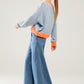 light wash extra wide leg jeans with pleats