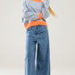 light wash extra wide leg jeans with pleats