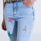 Light Wash Skinny Jeans With Stars On The Legs