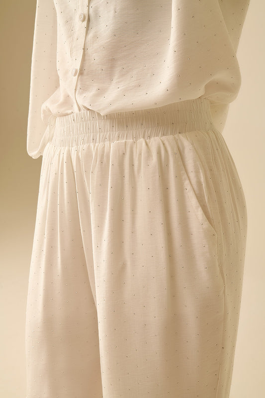 Lightweight wide-legged white pants with strass details