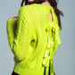 Lime green cable knit jumper with open back and bows