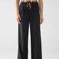 Q2 Long black pleated pants with leopard detail at the waist