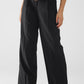 Long black pleated pants with leopard detail at the waist