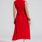 Long red dress with ruffle and button detail