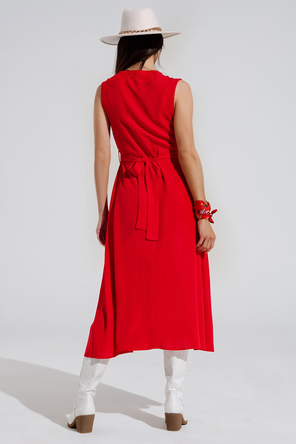 Long red dress with ruffle and button detail