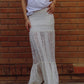 Q2 long white lace skirt fitted at the waist