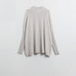 Q2 Loose beige sweater with fitted sleeves