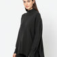 Loose black sweater with open back detail