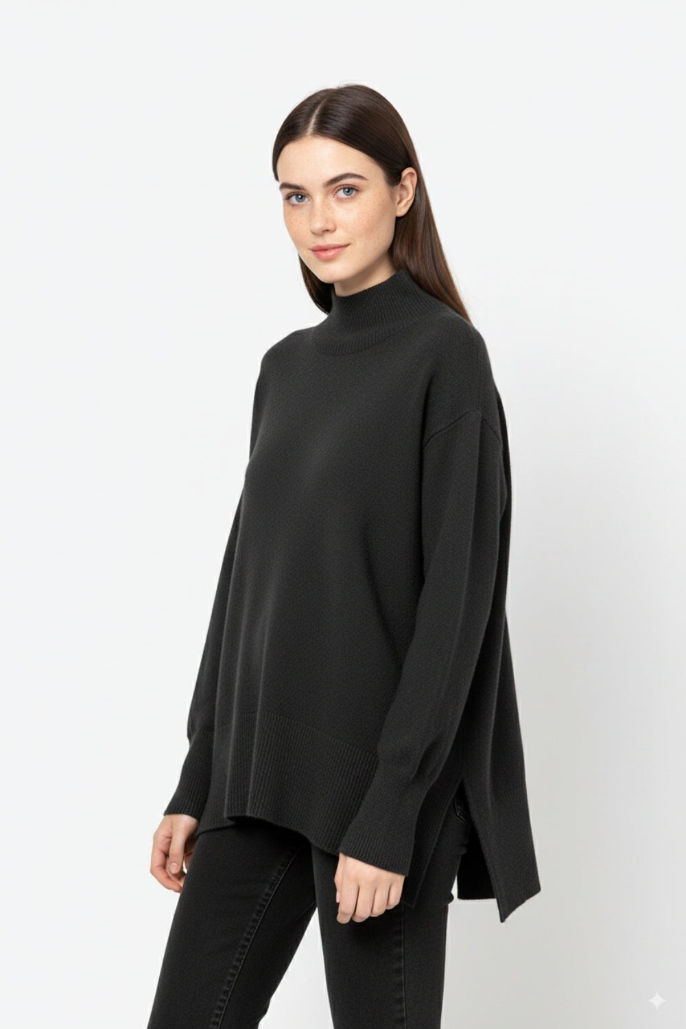 Loose black sweater with open back detail