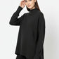Loose black sweater with open back detail