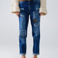 Q2 Loose blue jeans with subtle ripped design and patches