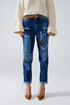 Q2 Loose blue jeans with subtle ripped design and patches