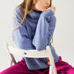 Q2 Loose blue sweater with dropped sleeves