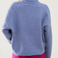 Loose blue sweater with dropped sleeves